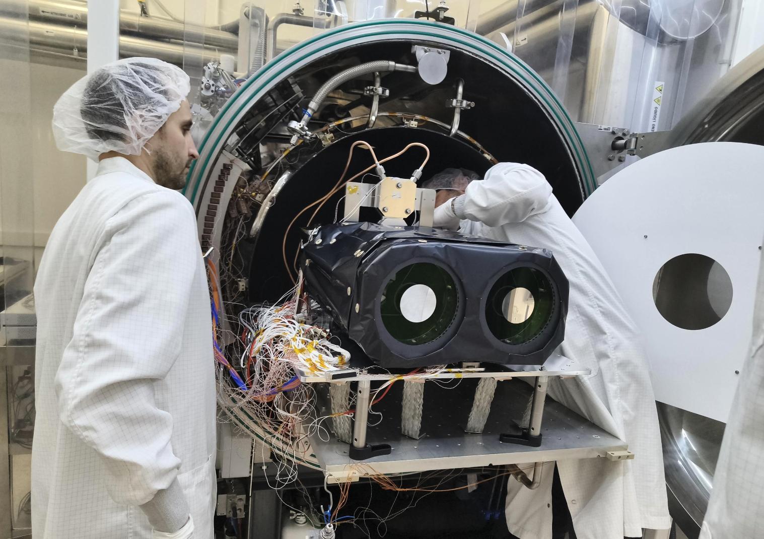 Members of the ARRAKIHS instrument team working on the scientific payload. Credit: Satlantis, IDR, UPM