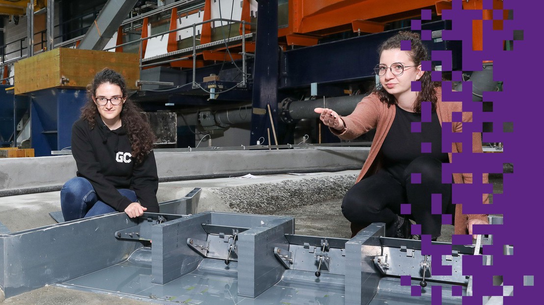 Méryl Schopfer and Julie Devènes, Master's students in Civil Engineering at the EPFL, in the hydraulic hall where a dam project on the Rhône is being tested. © 2021 Alain Herzog