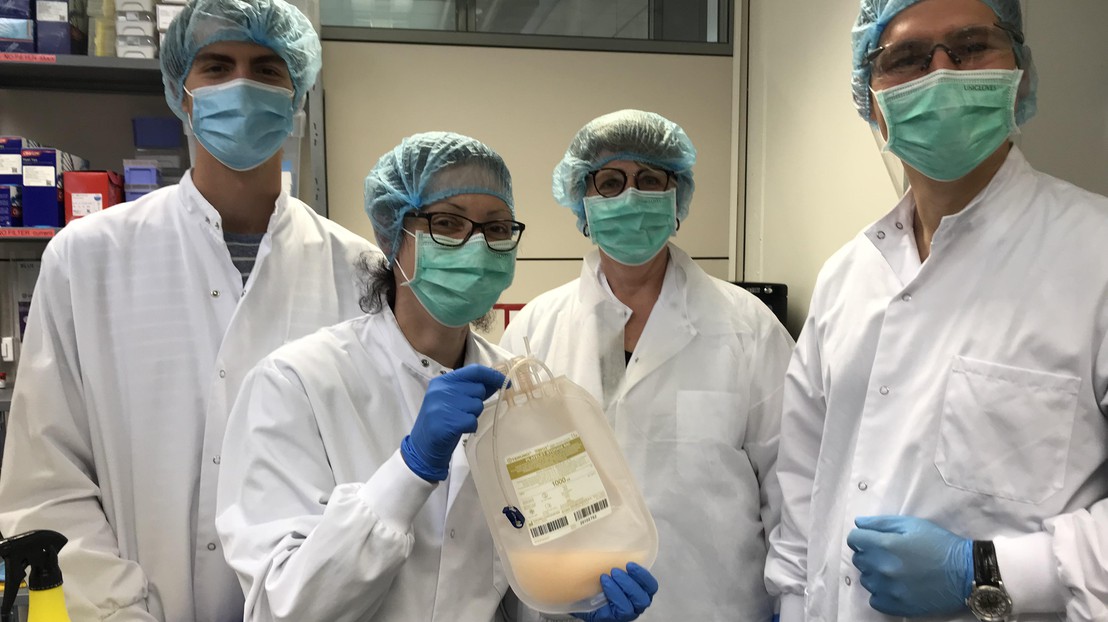 The start-up team with the first pocket of platelets produced using their system © 2022 HemostOD