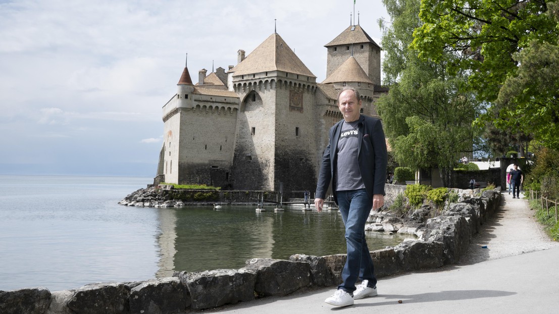 Marc walking by the Chillon Castle. He uses his neuroprosthetic up to 8 hours per day.