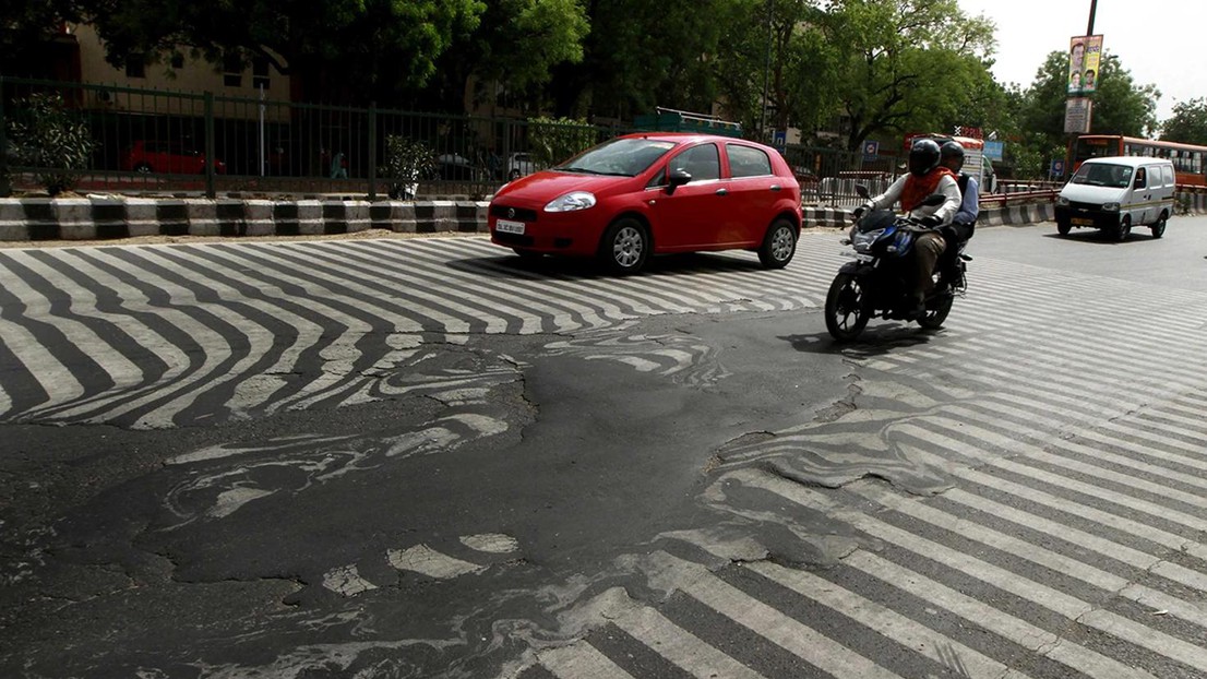 Traffic in India was disrupted this year by road surfaces melting. Credit: Sanjeev Verma/Hindustan Times via Getty