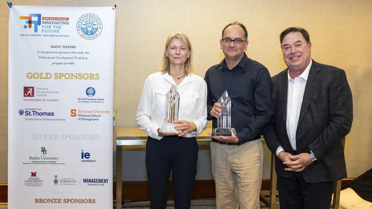 Marc Gruber (middle), Emmanuelle Fauchart (co-author, left) and Jon Carr (head of the Entrepreneurship Division of the Academy of Management, right © Pratyush Swarup