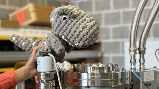 The experiment's mascot, an entirely handmade T-Rex  © Nadia Barth / EPFL