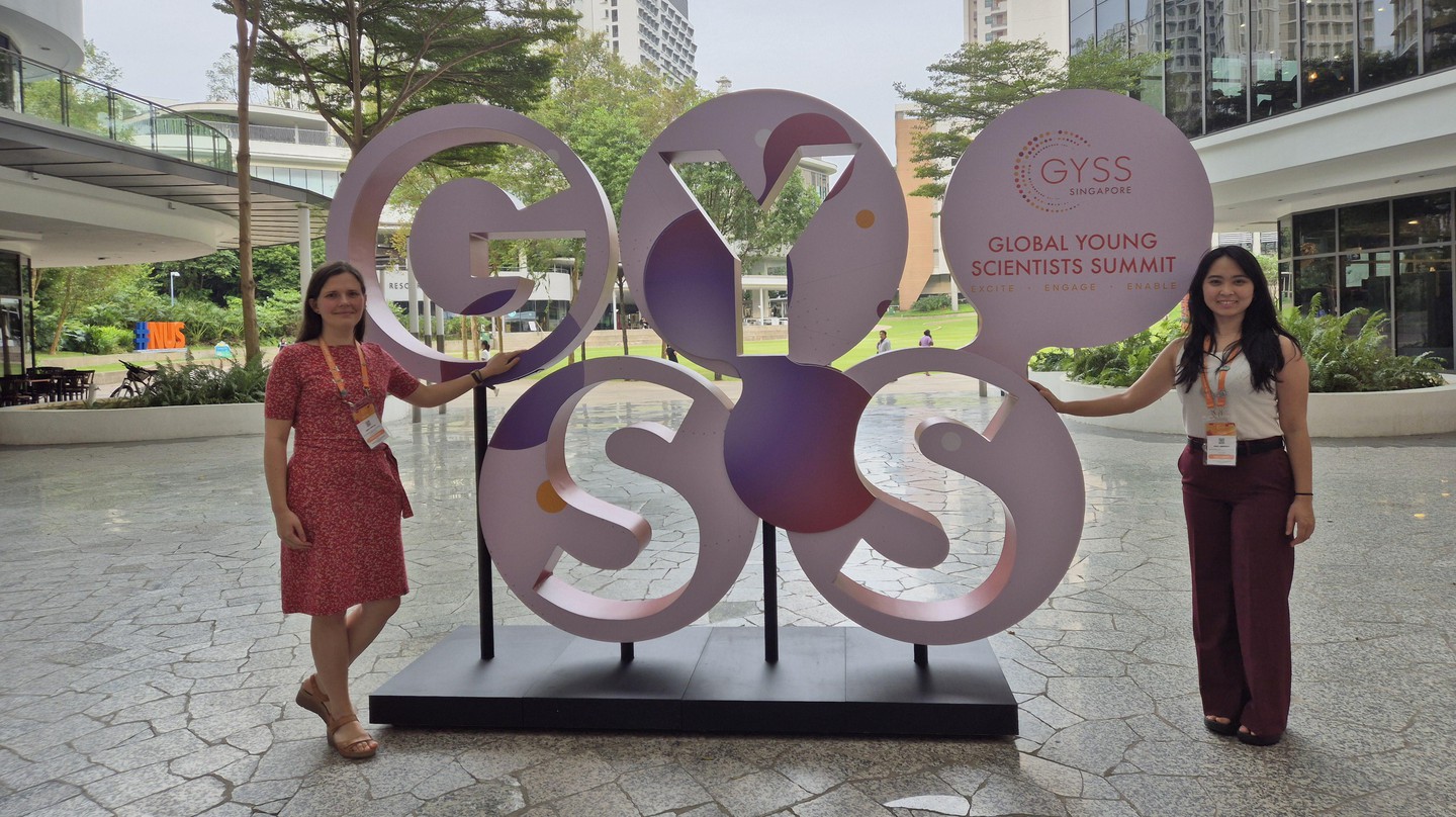 Anna Poryvai and Nana Obayashi at GYSS sign - 2025 Nana Obayashi