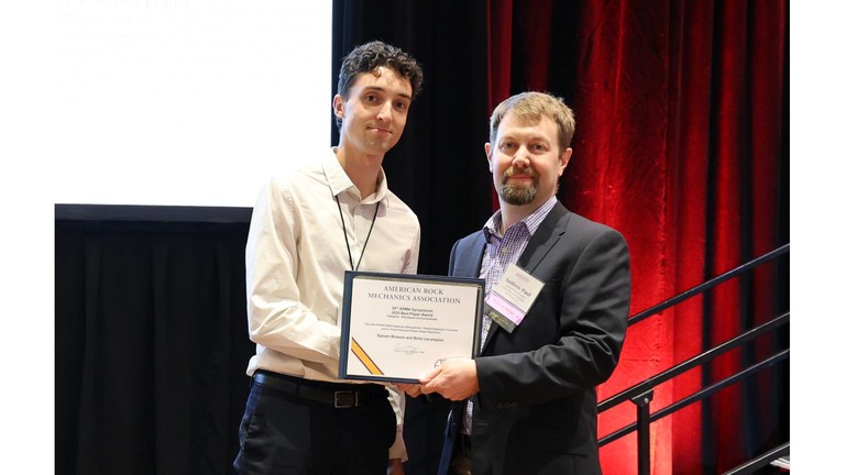 Sylvain Brisson receives his award from the ARMA president Prof. Andrew Bunger