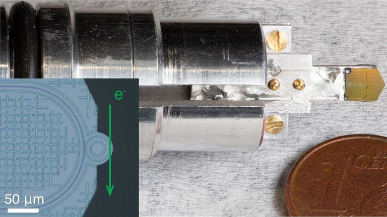 Photograph of the photonic chip mounted on a custom holder. Credit: Yang et al 2025. Photograph of the photonic chip mounted on a custom holder. Credit: Yang et al 2025.