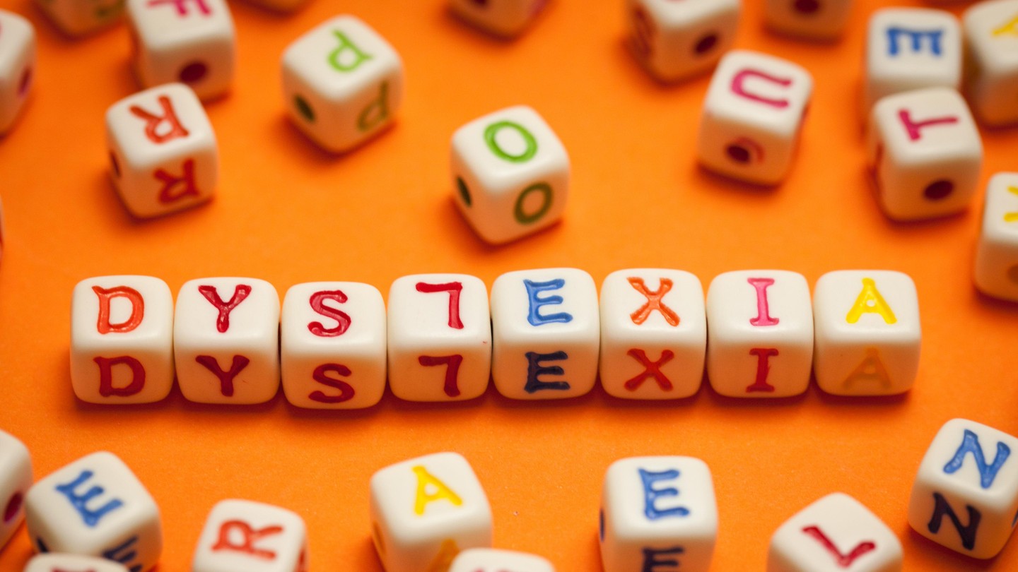 Letter dice representing dyslexia © iStock