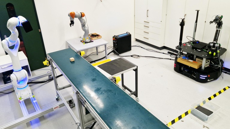 The assembly line task setup. 2026 LASA EPFL CC BY SA