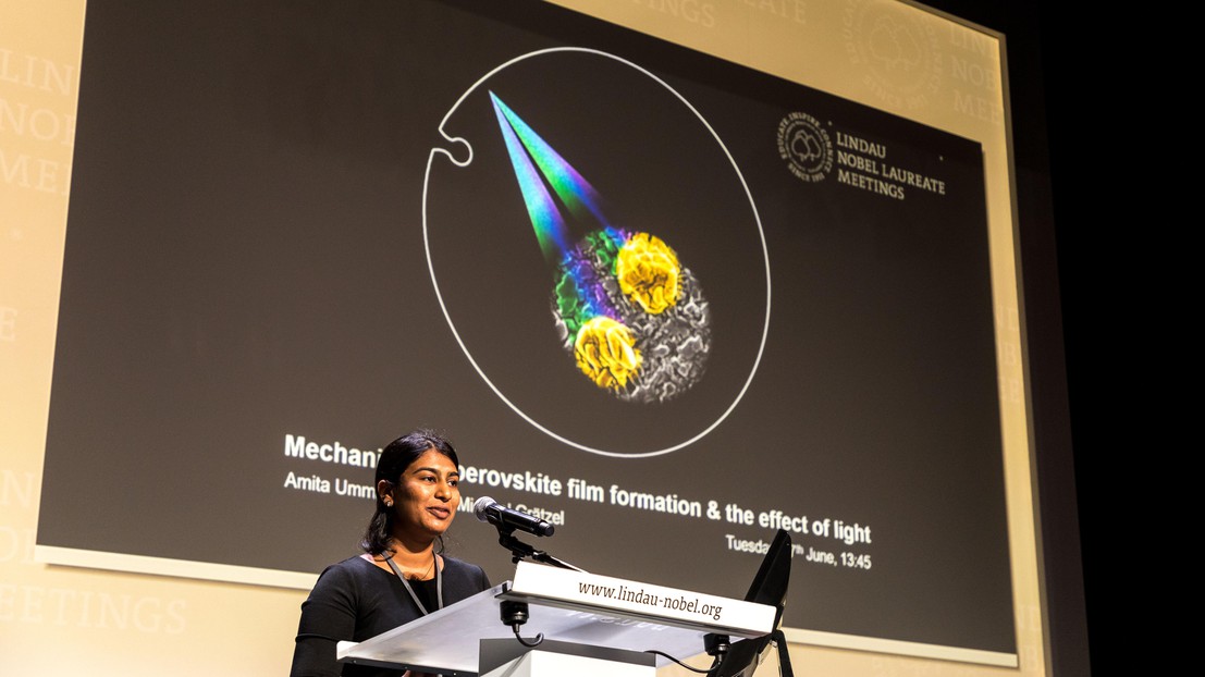 Ummadisingu giving her poster-flash on the the effects of light on perovskite film formation. ©Christian Flemming/Lindau Nobel Laureate Meetings