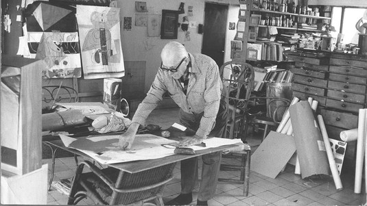 The studio in the 1960's, with Le Corbusier working. © Fondation Le Corbusier