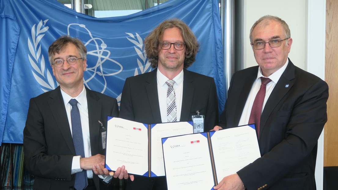 Andreas Mortensen and Andreas Pautz from EPFL,with Mikahil Chudakov, IAEA Deputy Director General (right) after signing the cooperation agreement, Vienna, 12 June 2019. © S. Krikorian / IAEA