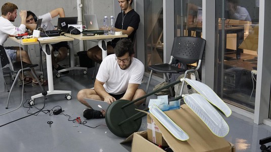 EPFL master's student Theo Denisart works on the Akane prototype © Marius Aeberli