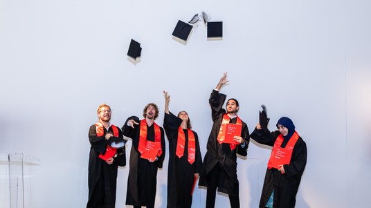 The new graduates celebrate © 2019 Jamani Caillet