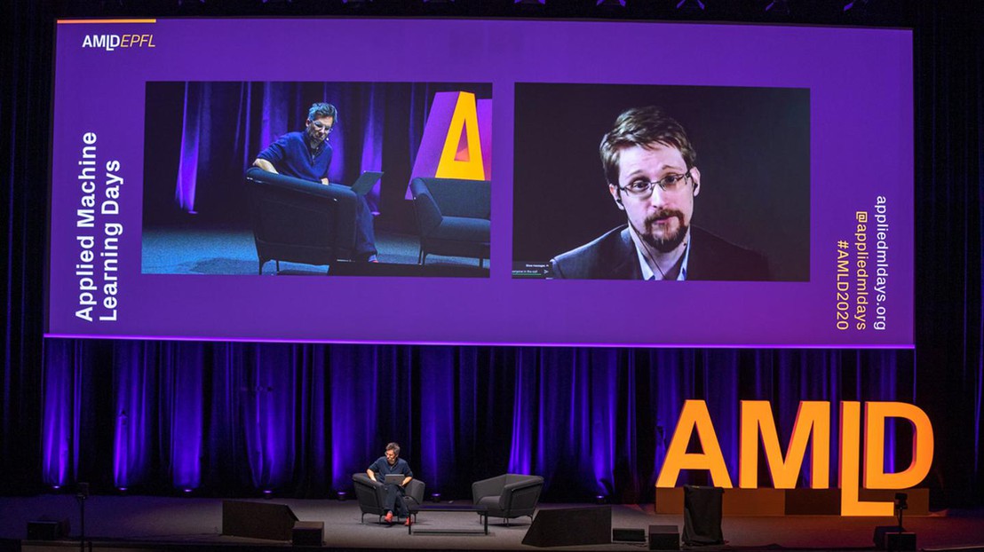 Edward Snowden speaks via videoconference with EPFL's Marcel Salathé at EPFL's AMLD conference © samueldevantery.com