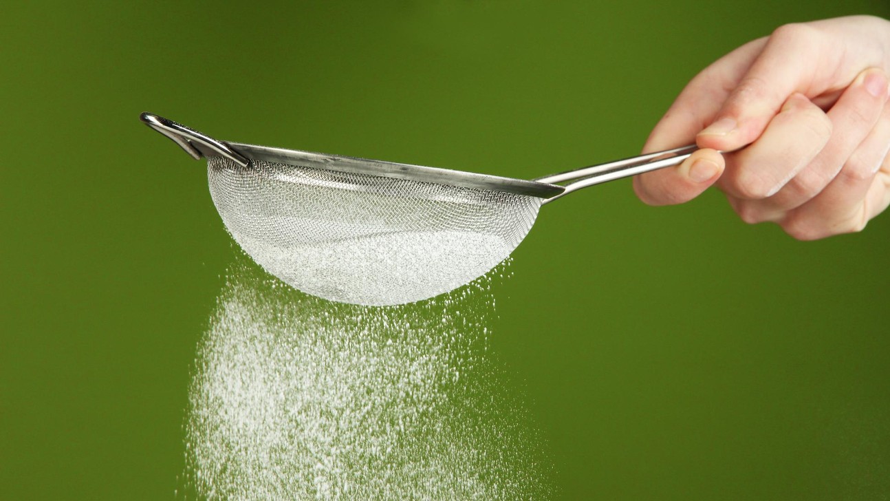 Strainer and powdered sugar © belchonock @ istock