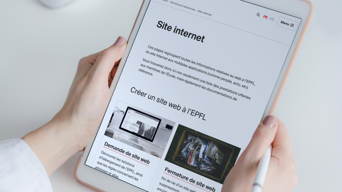 Photomontage of an iPad with the new "website" pages © 2020 Pexels / EPFL