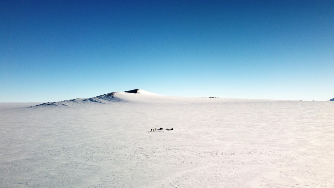 Working at the edge of the Antarctic plateau. Luckily, the typically strong winds were absent on that day (Photo © Preben Van Overmeiren, Ghent University).